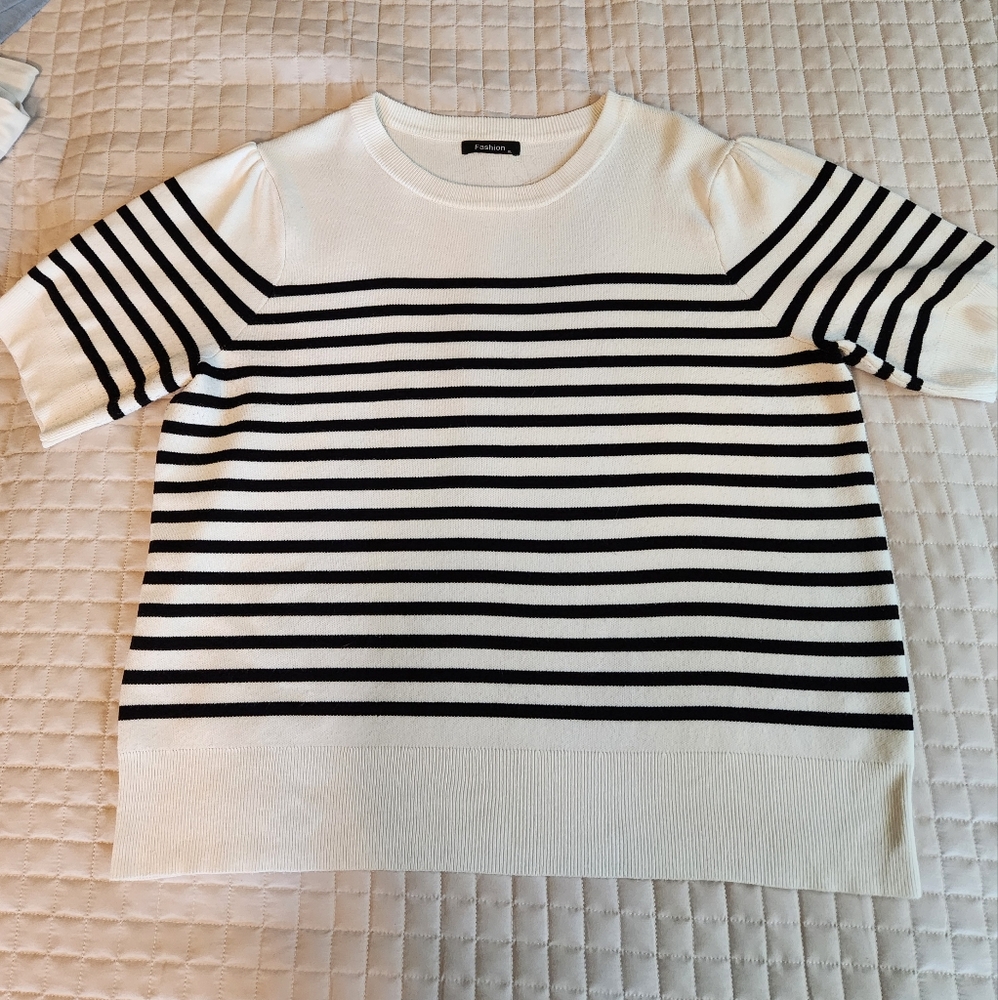 short-sleeved black and white sweater